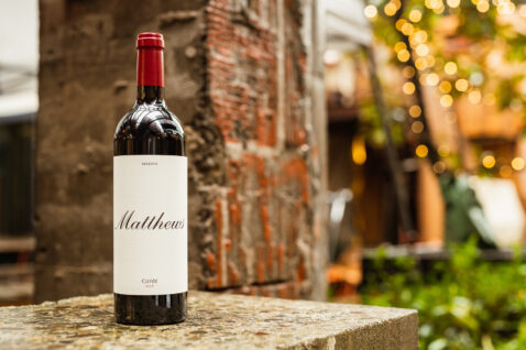 Close up of 2018 Reserve Cuvee bottle on ledge outside